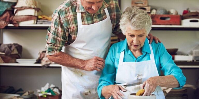 Elderly Couple Doing Pottery Together at Independent Living Facility